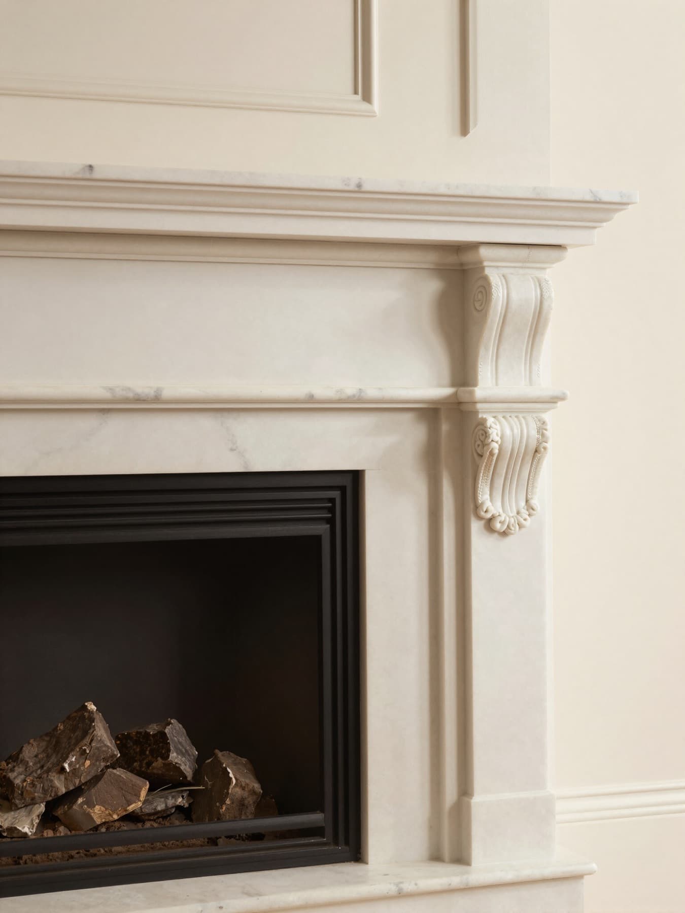 Spotless white marble fireplace mantel